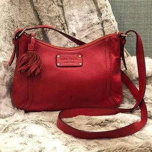 kate spade red leather crossbody with tassel